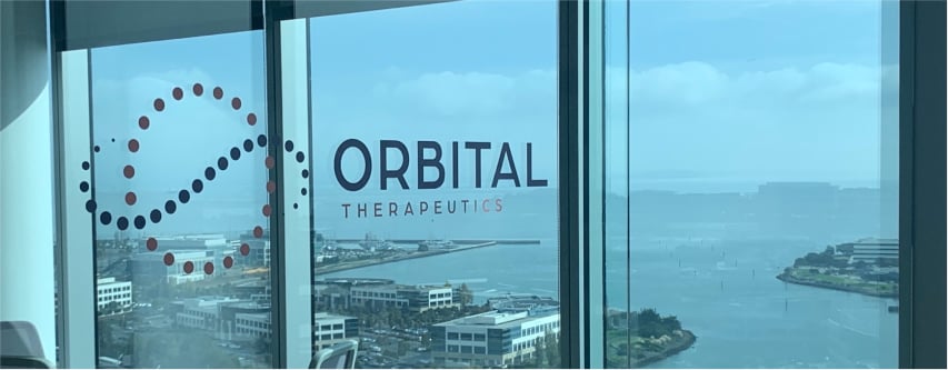 building window with Orbital logo on the glass